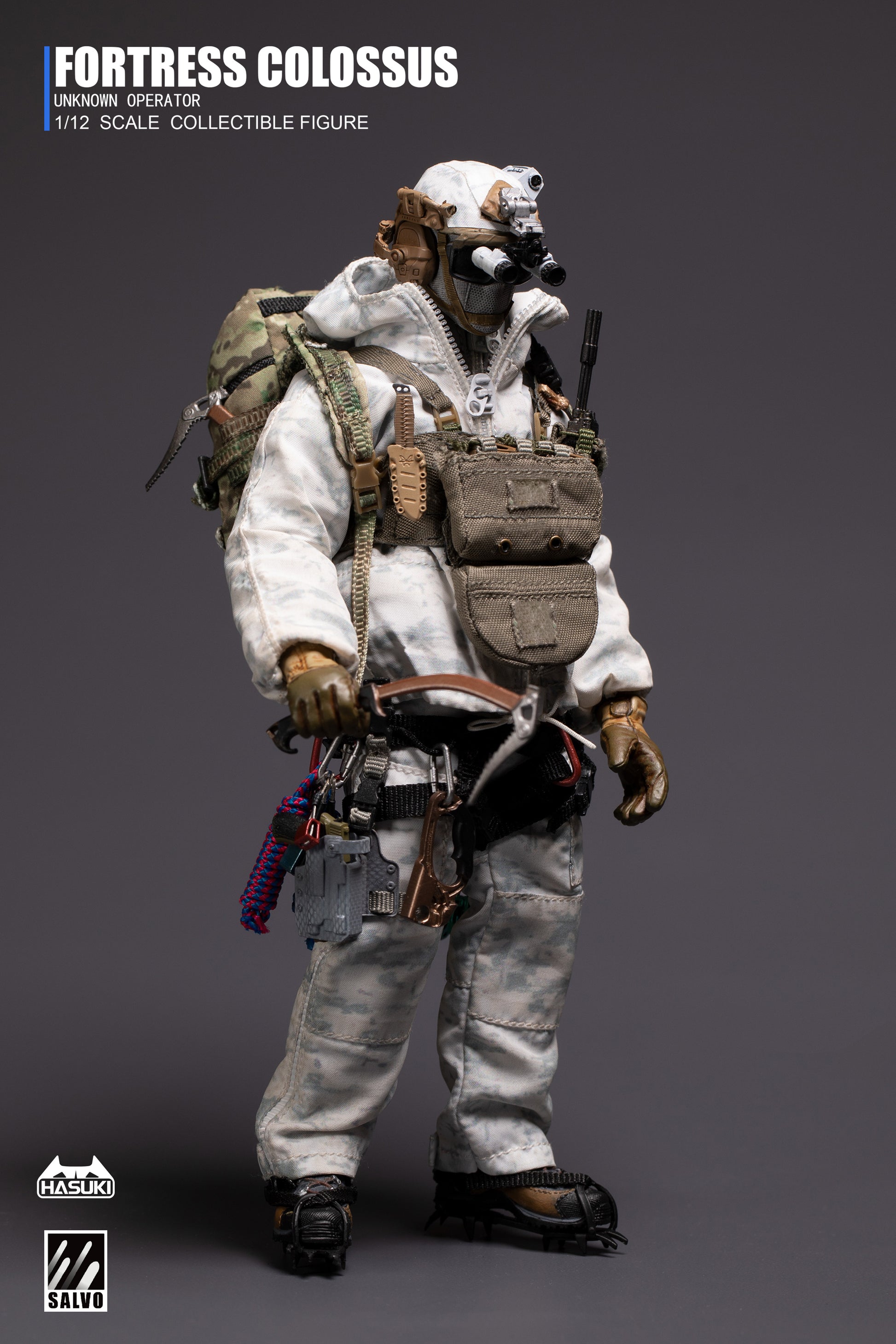 Snow camouflage suit and L7 cold weather jacket displayed flat with accessories